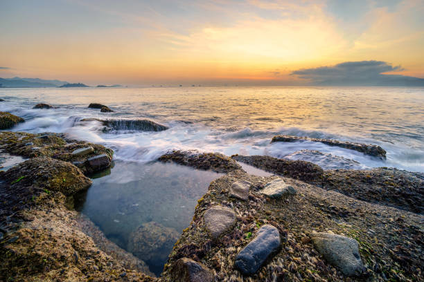 Waves on Nha Trang beach in sunrise, Khanh Hoa province, Central Vietnam