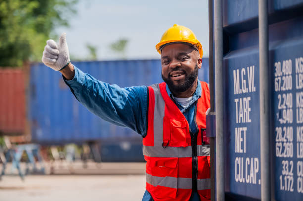 istock African American worker concept, African American worker working in warehouse containers for logistic import export, Black man worker 1440006826