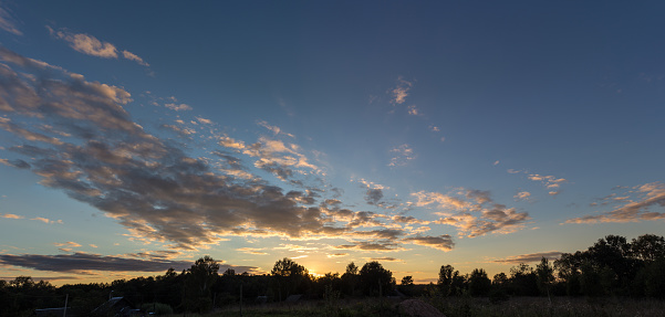 panorama of dramatic sunset and sky with clouds