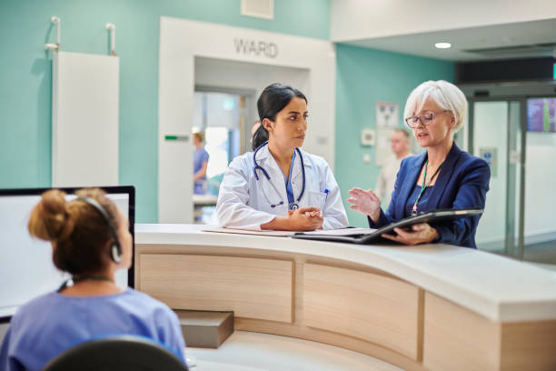 istock administrator with hospital doctor 1440009554