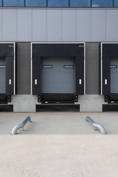istock Vertical shot of a loading dock at a warehouse 1440011756