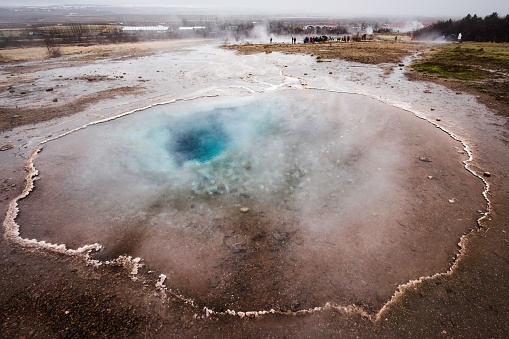 An aerial view of Strokkur fountain-type geyser in the Geysir Geothermal Area, Iceland