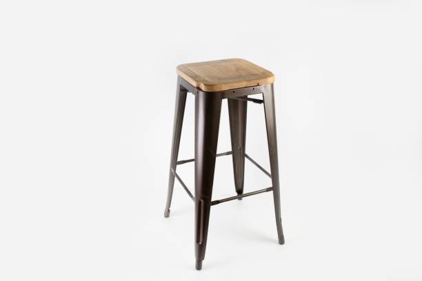 istock Brown bar stool with a wooden seat isolated on a white background 1440014575