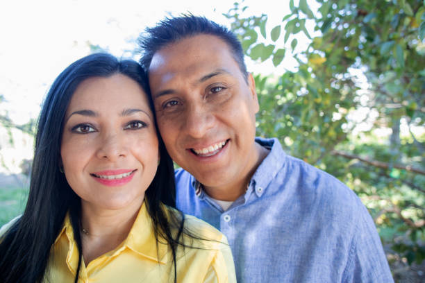 istock Couple in the park 1440015072