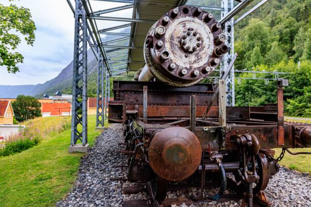 istock Vintage rusty steam train in scenic countryside 1440015362