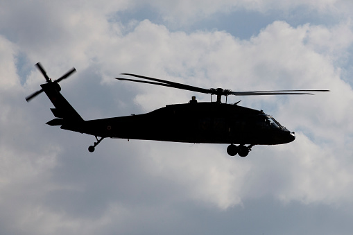 Photos of Military Helicopter Flying Over Sky