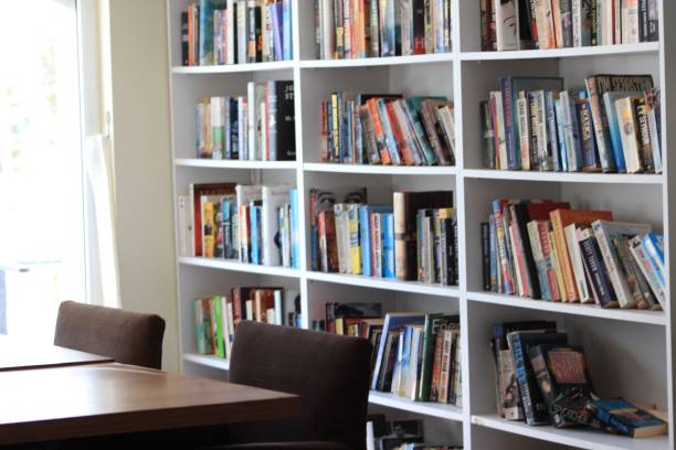 istock Great library with shelves full of books 1440018284