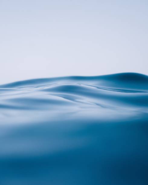 istock Vertical shot of blue texture looking like ice water 1440019788