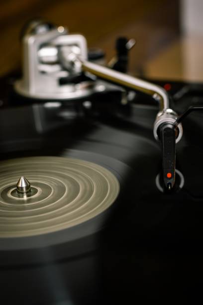 istock Vertical closeup shot of a vintage record player on a blurred background 1440020128