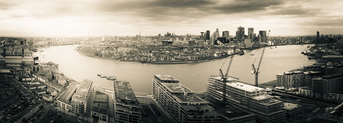 A grayscale aerial photography shot of the industrial district in London