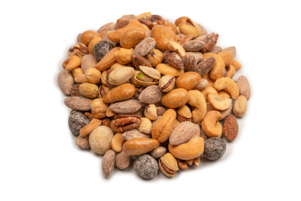 istock A group of almonds, pistachios, walnuts, macadamia, cashews. 1440021256