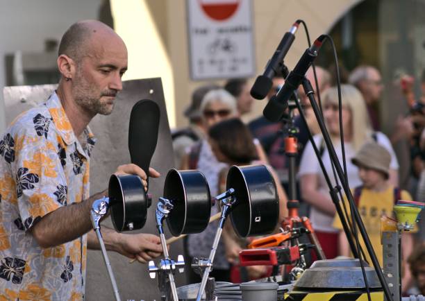 Meran, Italy – June 25, 2022: A percussionist using everyday objects. This street artist performed during the annual Asfaltart Festival in Meran, South Tyrol, Italy.