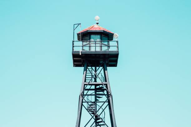 istock Low angle shot of a black lifeguard tower with red rooftop 1440022919
