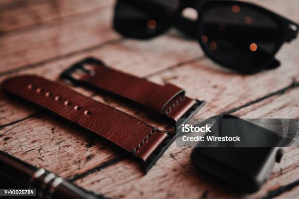 Closeup Of A Black Bezel Smartwatch And A Brown Leather Strap Stock Photo - Download Image Now