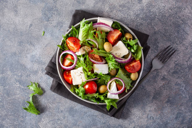 istock tomato salad with brie cheese olives onion lettuce 1440025928