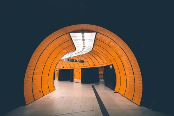 An interior shot of an empty underground passage in Munich, Germany