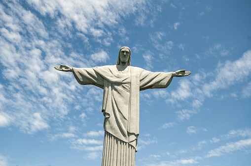 A low angle shot of the statue of the Christ the Redeemer in Brazil at daytime