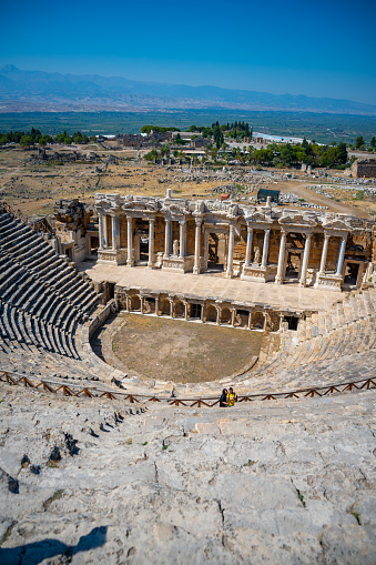 Hierapolis, Turkey - September 14, 2022: View of the Pamukkale Amphitheater, the ruined city of Hierapolis, Turkey.