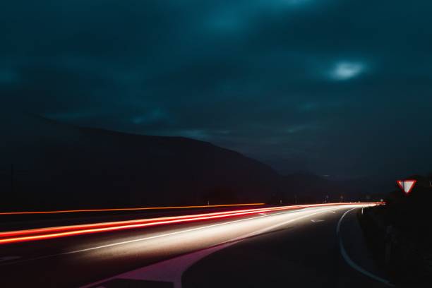 Free Stock Photo of A Car Speeding Down a Highway at Night | Download ...