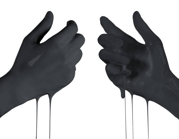 istock Woman's hands in black color holding something empty front and back side, isolated on white background. 1440028963