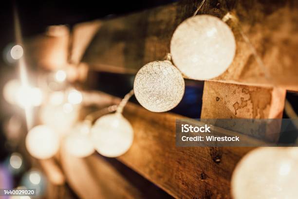 Beautiful Closeup Shot Of Lit Up Indoor String Lights Hanged Up On A Wall Stock Photo - Download Image Now