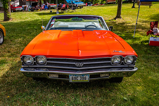 Des Moines, IA - July 02, 2022: High perspective front view of a 1969 Chevrolet Chevelle SS Convertible at a local car show.