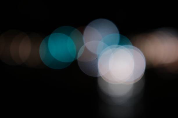 istock Blurred shot of lights at nighttime 1440030235
