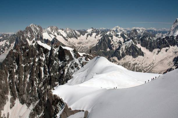 istock Magnificent mountains covered with snow  under the blue sky 1440031556