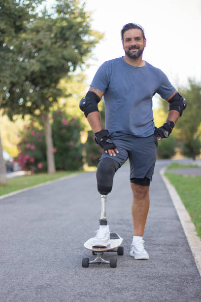 istock Portrait of handsome bearded with skateboard 1440031793