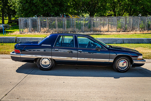 Des Moines, IA - July 02, 2022: High perspective side view of a 1992 Buick Roadmaster Sedan at a local car show.