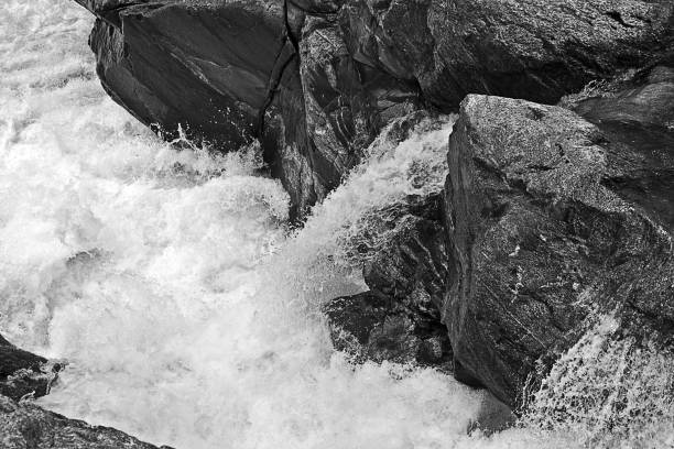 istock Grayscale shot of rock formations in the river 1440032504