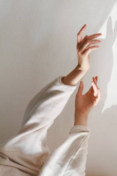 istock Calming movement of female's thin soft hands 1440032880