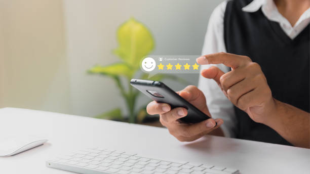 istock Businessman pressing face emoticon rating on virtual touch screen to service experience. Customer service and Satisfaction concept. 1440033012