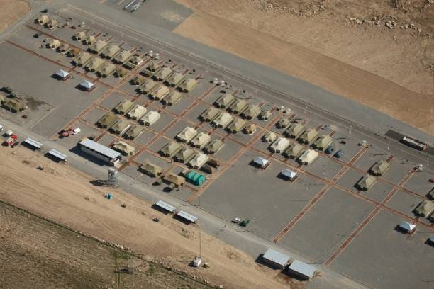Overhead aerial shot of a military base in the rocky mountains An overhead aerial shot of a military base in the rocky mountains military base stock pictures, royalty-free photos & images