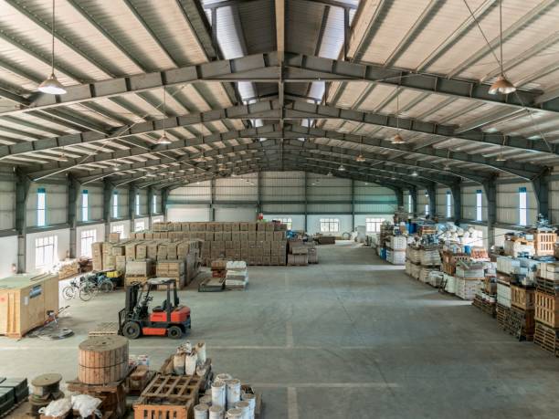 istock Interior shot of a warehouse with forklifts 1440033164