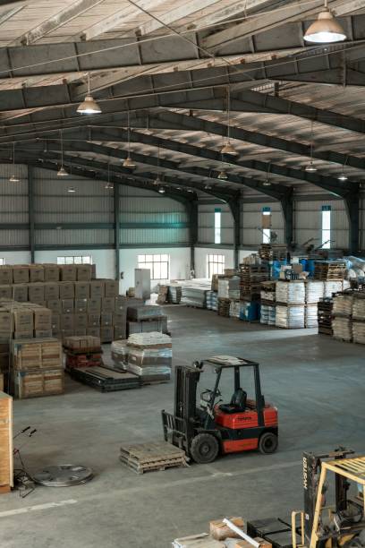 istock Vertical shot of a forklift in a warehouse 1440033168