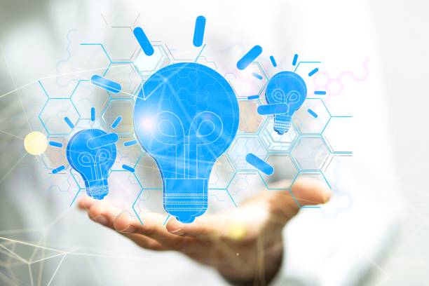 istock 3D rendering of lightbulbs floating above a hand, a concept of a new idea 1440033652