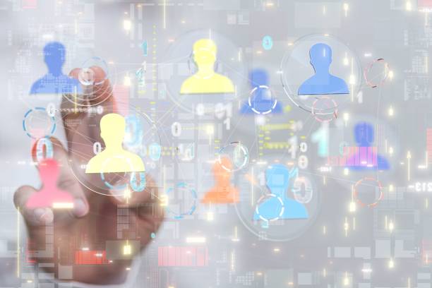 istock Fingers posing on illustrative human communication blockchain floating in the air 1440033676