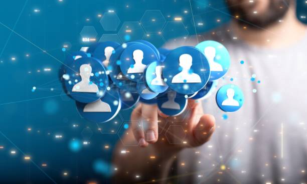 istock Man touching 3D rendered people signs 1440033784
