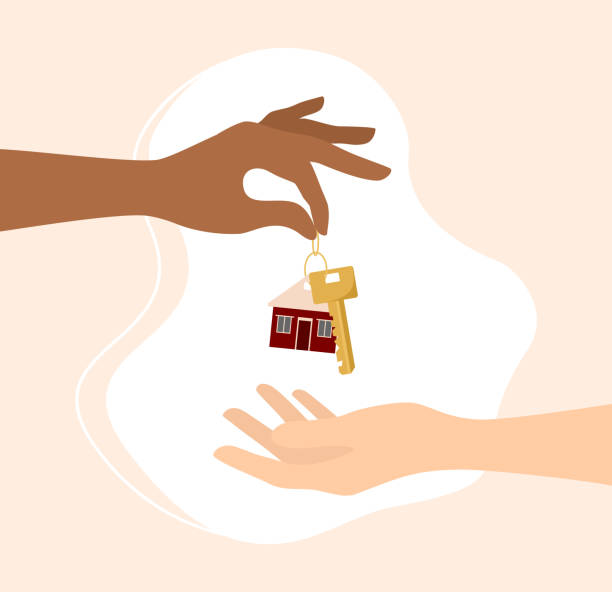 istock A hand giving a key with a house keychain to a buyer. Vector real estate concept in flat style 1440034744