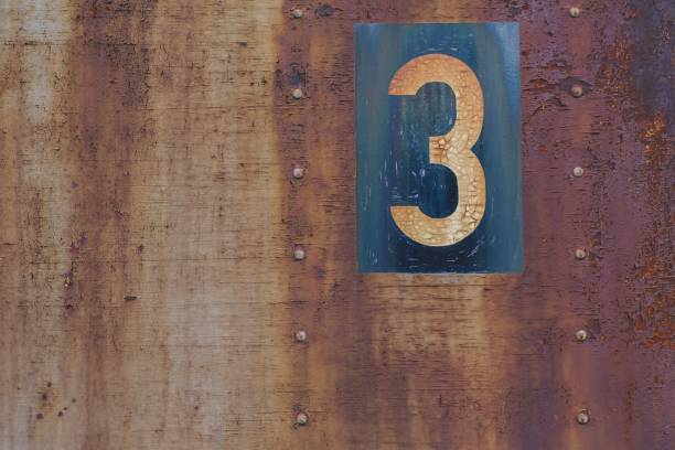 istock Close shot of a number 3 written on a rusty metal surface 1440035976