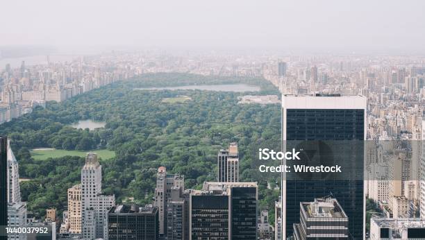 Aerial Photo Of Central Park With A Lot Of Highrise Buildings And Trees Covered In Fog Stock Photo - Download Image Now