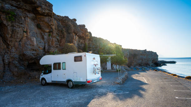 istock Motorhome RV parked on beach under a cliff, Crete, Greece. 1440039410
