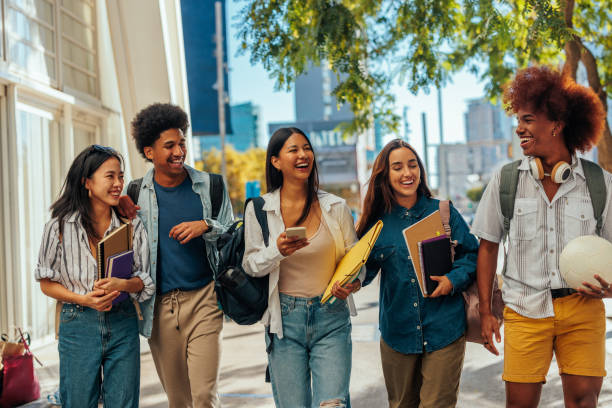 istock Group of students leisure time in city. 1440040206