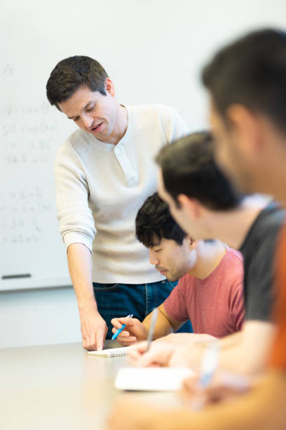 istock Med Student Tutor - University Students in Conference Room Learning Medicine - Small Group Teaching - Study Room - Med Student 1440040318