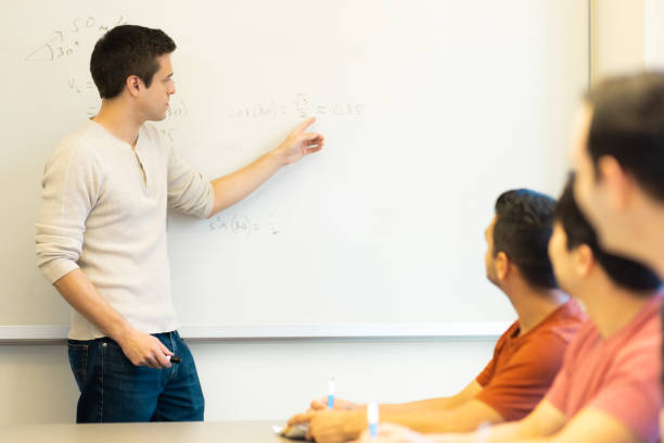 istock Med Student Tutor - University Students in Conference Room Learning Medicine - Small Group Teaching - Study Room - Med Student 1440040735