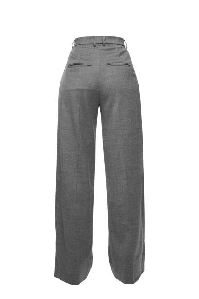 istock Long gray pants isolated in white background, invisible mannequin 1440042006