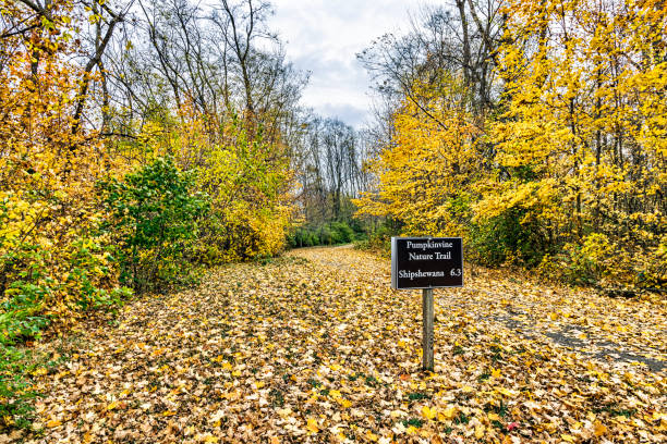 istock Sign on Bicycle trail in Autumn 1440043044