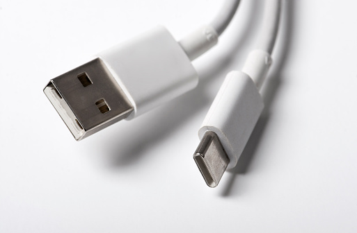White USB Type-C charger cable on white background