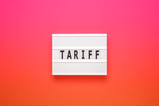 istock Lightbox with word tariff on pink gradient background. Business concept on white background. Top view. 1440045450